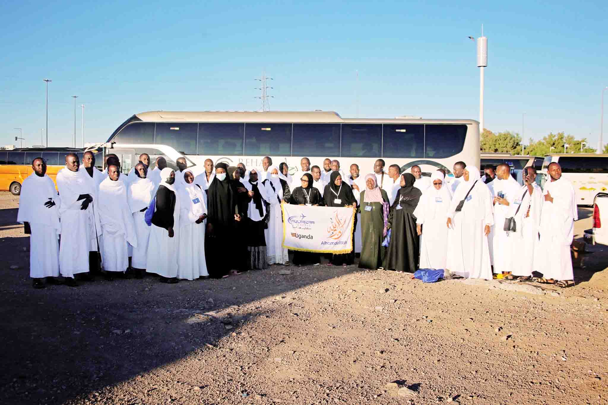 First pilgrimage group with Multazam Travels banner